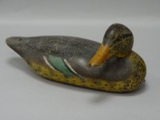 A VINTAGE CARVED WOOD & PAINTED DUCK DECOY, 33 cms long
