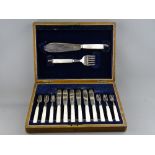 AN OAK CASED SILVER WITH MOTHER OF PEARL HANDLED FISH KNIVES & FORKS SET WITH SERVERS, Sheffield