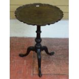 A VICTORIAN MAHOGANY TILT TOP TRIPOD TABLE with piecrust edge, 71 cms high, 51 cms diameter the top