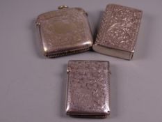 A BRIGHT CUT SILVER VESTA CASE with all over floral decoration, Birmingham 1886 and two