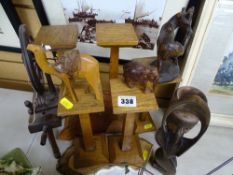 Quantity of treen items including a mini spinning wheel and carved animals etc