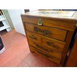 Oriental camphorwood lidded chest on four drawer base with lock and key