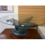 Glass topped oval coffee table with carved Pegasus sculptured base, signed 'Casasola'