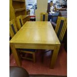 Excellent modern oak extending dining table and four chairs