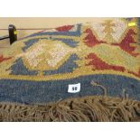 Tapestry style woven rug