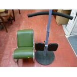 Vintage exercise machine and a chrome framed small seat