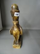 Composition marble effect figure of an Egyptian hawk