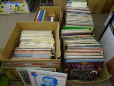 Four boxes of vintage LP records, American organists, vocal female groups, comedy, boxed sets etc