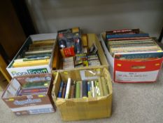 Three boxes of vintage reference and other books, an assortment of music cassettes and vinyl etc