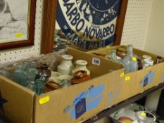 Two boxes of small earthenware pots and vintage chemist's or similar bottles