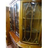 Polished dark wood display cabinet with lower base cupboards and a glazed top corner unit with