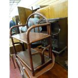 Narrow telephone table with leather tooled slider and a bamboo whatnot