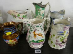 Collection of Victorian relief moulded and painted jugs