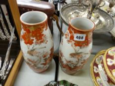 Pair of Kutani decorated baluster vases