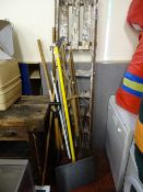 Quantity of long handled garden tools and a wooden stepladder