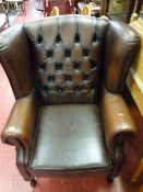 Brown leather effect button upholstered wingback armchair