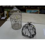 Bird cage and a metallic hanging basket