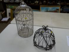 Bird cage and a metallic hanging basket
