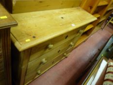 Vintage stripped pine chest of three drawers with turned wooden knobs