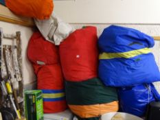Large quantity of boat sails in various canvas bags