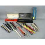Collection of vintage fountain pens with other writing and drawing paraphernalia including Mabie