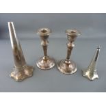 Pair of loaded base candlesticks and two epergne flutes, all hallmarked silver