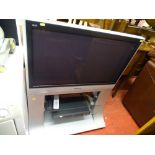 Excellent Panasonic LCD TV on stand with Samsung DVD player E/T