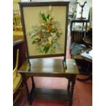 Oak barley twist two tier side table and a floral decorated firescreen