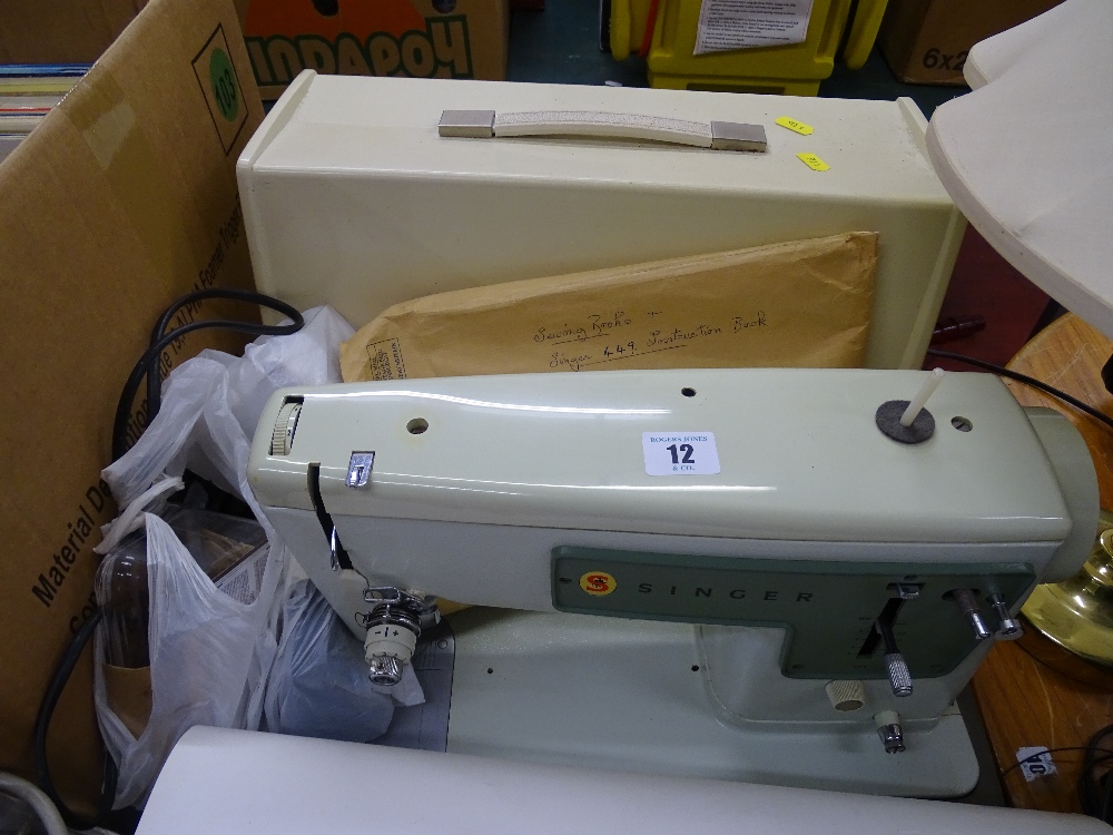 Singer electric sewing machine in case E/T