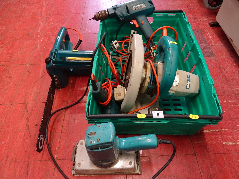 Crate of Black & Decker DN412 chainsaw, Wolff angle grinder and other electrical items E/T