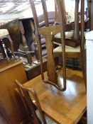 Well restored oak draw leaf dining table on bulbous supports and four high back dining chairs with