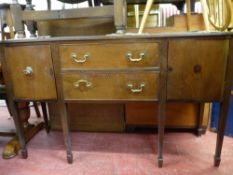 Reproduction Sheraton style sideboard on tapering supports and spade feet