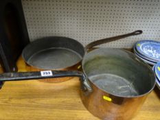 Two vintage copper cooking pans with iron handles