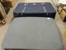 Modern canvas suitcase and one other