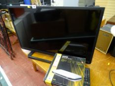 Toshiba 32 ins LCD TV and a Bush digital set top box E/T