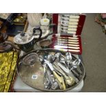 Four piece EP teaset, two handled galleried tray and a quantity of boxed and loose cutlery