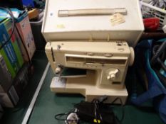 Cased electric Singer sewing machine E/T