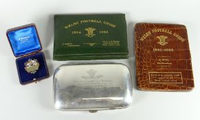 FOUR RARE & EARLY WELSH RUGBY ARTEFACTS comprising (1) an enamel on silver lapel-pin for Scotland
