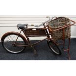 A VINTAGE RALEIGH CHIMNEY SWEEP'S BIKE FOR SV BRUNKER OF CARDIFF complete with oversize wicker