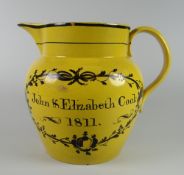 A POSSIBLY WELSH POTTERY MARRIAGE JUG for John & Elizabeth Cook 1811 to the obverse and verso a