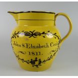 A POSSIBLY WELSH POTTERY MARRIAGE JUG for John & Elizabeth Cook 1811 to the obverse and verso a