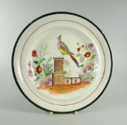 A SWANSEA DILLWYN POTTERY 'BIRD ON PEDESTAL' PLATE with polychrome decoration to the interior,