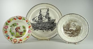 THREE SWANSEA POTTERY PLATES comprising Dillwyn 'Ship Plate' (damage), 22.5cms diam a colourfully