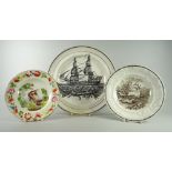 THREE SWANSEA POTTERY PLATES comprising Dillwyn 'Ship Plate' (damage), 22.5cms diam a colourfully