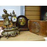 A polished barley-twist clock, a mid century veneered table clock & a gilt spelter figural clock