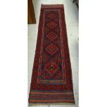 A 100% hand knotted woollen Meshwani runner, 248 x 65cms