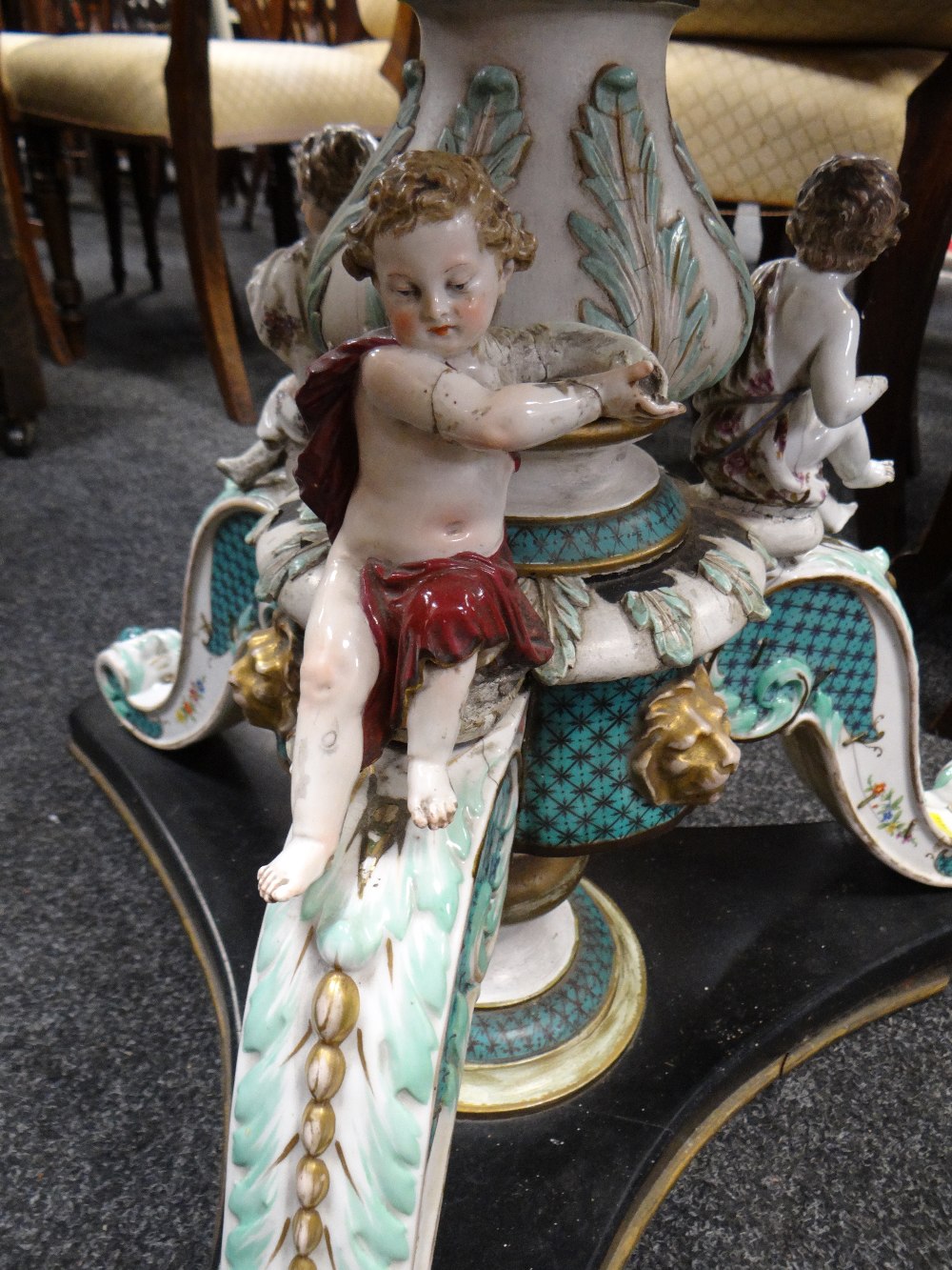 An unusual antique table having an Italianate porcelain & wooden painted cherubic tri-form base - Image 4 of 5