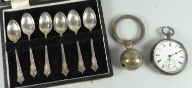 A cased set of six silver teaspoons together with a silver pocket watch & a baby's rattle