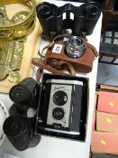 A vintage Halina Anastiget 35X camera, a Brownie Reflex camera in original box & two pairs of old