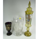 A heavy quality glass footed-vase, a Bavarian coloured-glass transfer decorated vase & another